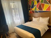Hotelinn Oniru客房内的一张或多张床位