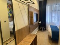 Hotelinn Oniru客房内的一张或多张床位