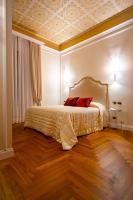 Boutique Hotel Puccini客房内的一张或多张床位