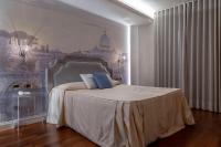 Boutique Hotel Puccini客房内的一张或多张床位