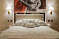 Boutique Hotel Puccini客房内的一张或多张床位