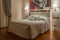 Boutique Hotel Puccini客房内的一张或多张床位