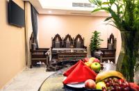 Marwa Palace Hotel Cairo的电视和/或娱乐中心