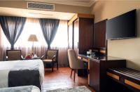 Marwa Palace Hotel Cairo的电视和/或娱乐中心