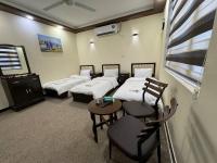 SAFIR BAGHDAD HoTEL客房内的一张或多张床位