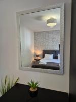 Apartments MilaRoza客房内的一张或多张床位