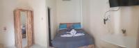 Ceria House Ungasan Uluwatu客房内的一张或多张床位