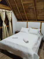 Villa Ester Hostel Vereda Cay客房内的一张或多张床位