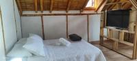 Villa Ester Hostel Vereda Cay的电视和/或娱乐中心