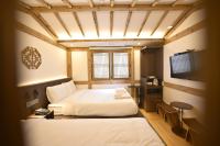 Hanok Hotel DAAM Seoul客房内的一张或多张床位