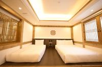 Hanok Hotel DAAM Seoul客房内的一张或多张床位