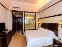 Vienna International Hotel Shenzhen North Station Branch客房内的一张或多张床位