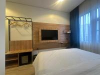 Hotelinn Oniru客房内的一张或多张床位