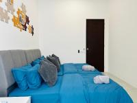BM大山脚 Double Storey Terrace Autocity Alma Aeon Jusco Nearby客房内的一张或多张床位