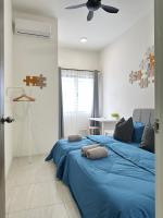 BM大山脚 Double Storey Terrace Autocity Alma Aeon Jusco Nearby客房内的一张或多张床位