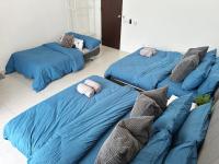 BM大山脚 Double Storey Terrace Autocity Alma Aeon Jusco Nearby客房内的一张或多张床位