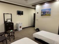 SAFIR BAGHDAD HoTEL的电视和&#47;或娱乐中心