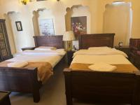 Heritage Home Guest House客房内的一张或多张床位