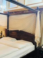 Heritage Home Guest House客房内的一张或多张床位
