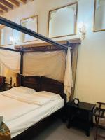 Heritage Home Guest House客房内的一张或多张床位