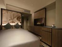 ORIENTAL HOTEL UNIVERSAL CITY客房内的一张或多张床位