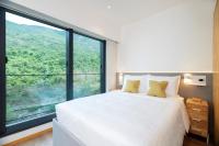 Shama Hub Metro South Hong Kong客房内的一张或多张床位