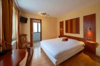 Hôtel A la Vignette - COLMAR-NORD客房内的一张或多张床位
