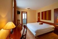 Hôtel A la Vignette - COLMAR-NORD客房内的一张或多张床位