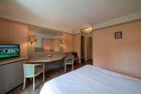 Hôtel A la Vignette - COLMAR-NORD客房内的一张或多张床位
