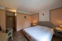Hôtel A la Vignette - COLMAR-NORD客房内的一张或多张床位