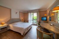 Hôtel A la Vignette - COLMAR-NORD客房内的一张或多张床位