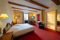Hôtel A la Vignette - COLMAR-NORD客房内的一张或多张床位