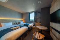 hotel around TAKAYAMA, Ascend Hotel Collection客房内的一张或多张床位