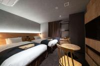 hotel around TAKAYAMA, Ascend Hotel Collection客房内的一张或多张床位