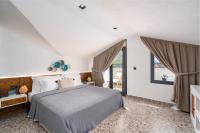 Ölüdeniz Blu Luxury Unique Hotel - Adults-Only客房内的一张或多张床位