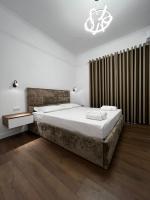 Villa Niku Berat客房内的一张或多张床位