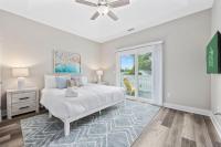 Pier View - Spacious Home Sleeps 8 - Pet Friendly客房内的一张或多张床位