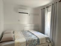 Eilat Beach House客房内的一张或多张床位