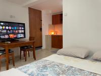 Eilat Beach House客房内的一张或多张床位