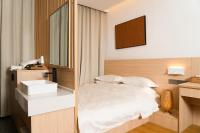 Aishe Honeymoon Erhai Lake Sea View Guesthouse客房内的一张或多张床位