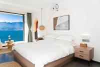 Aishe Honeymoon Erhai Lake Sea View Guesthouse客房内的一张或多张床位