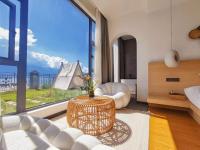 Aishe Honeymoon Erhai Lake Sea View Guesthouse的休息区
