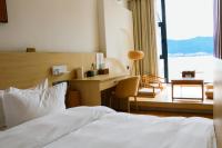Aishe Honeymoon Erhai Lake Sea View Guesthouse客房内的一张或多张床位