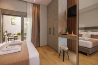 Jolly Suites客房内的一张或多张床位