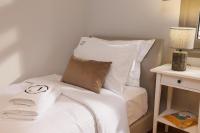Jolly Suites客房内的一张或多张床位