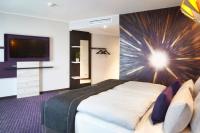 Holiday Inn - the niu, Air Frankfurt Messe by IHG的电视和/或娱乐中心