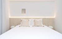 Nathan&#39;s Suites On The Beach客房内的一张或多张床位