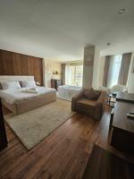 The Home Boutique Hotel Pyramids Inn客房内的一张或多张床位