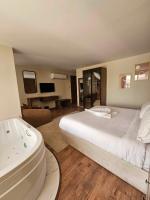 The Home Boutique Hotel Pyramids Inn客房内的一张或多张床位