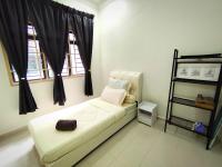 AA Homestay Bandar Mahkota Banting客房内的一张或多张床位